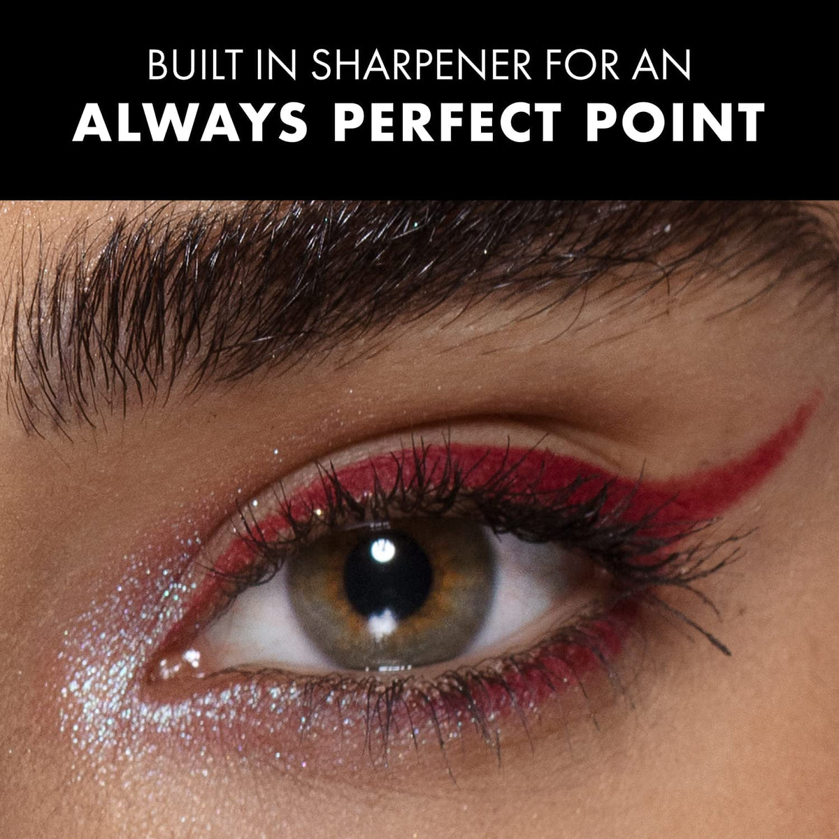 Milani applying eyeliner to upper lash line for defined look