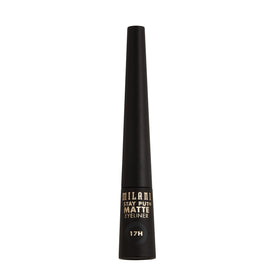 Milani liner placed beside a coin to show compact size and easy handbag portability benefit