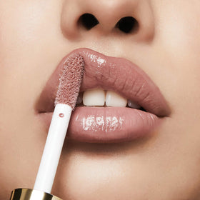 Milani clear gloss droplet emphasizing creamy texture and non-sticky feel