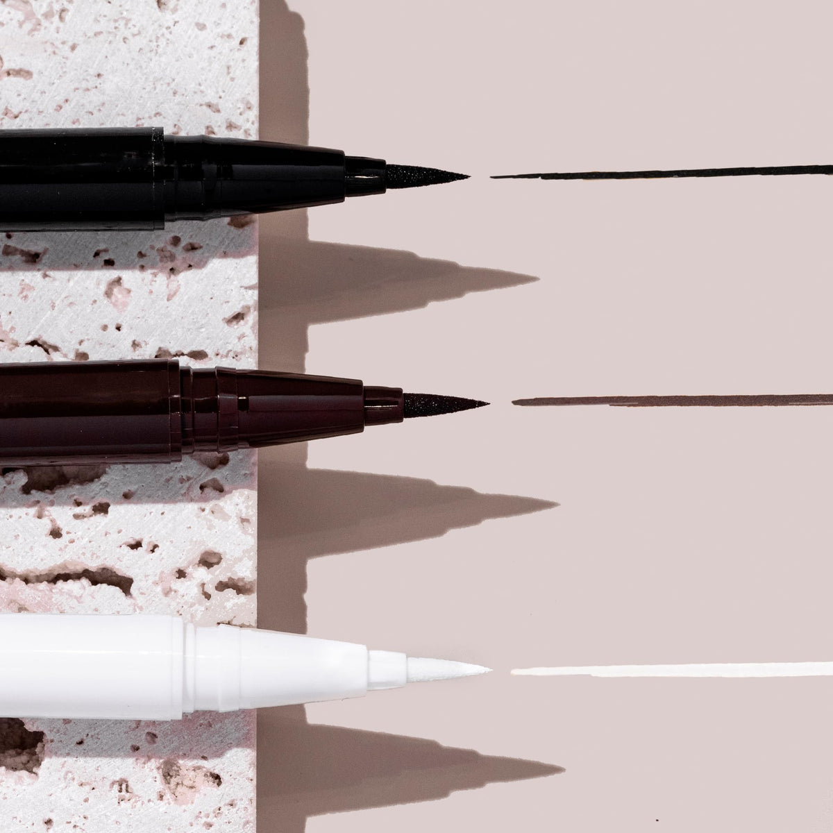 Milani waterproof test with water drops showing transfer resistance and durable wear