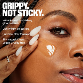 Milk Makeup gel texture of Hydro Grip on fingertip showing hydration benefit: dewy finish