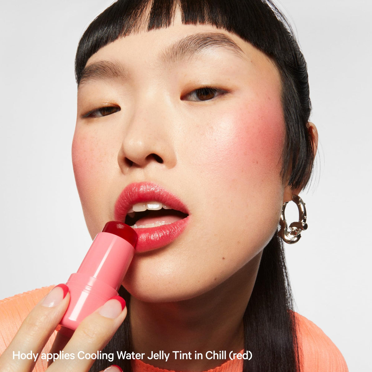 Lifestyle shot of Milk Makeup tint in a bathroom setting for everyday routine ease