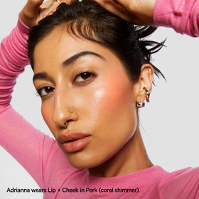 Milk Makeup lip + cheek stick beside mango and avocado illustrating nourishing ingredient benefits