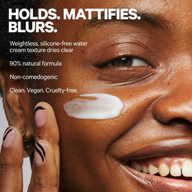 Hand applying Milk Makeup primer demonstrating smooth base benefit
