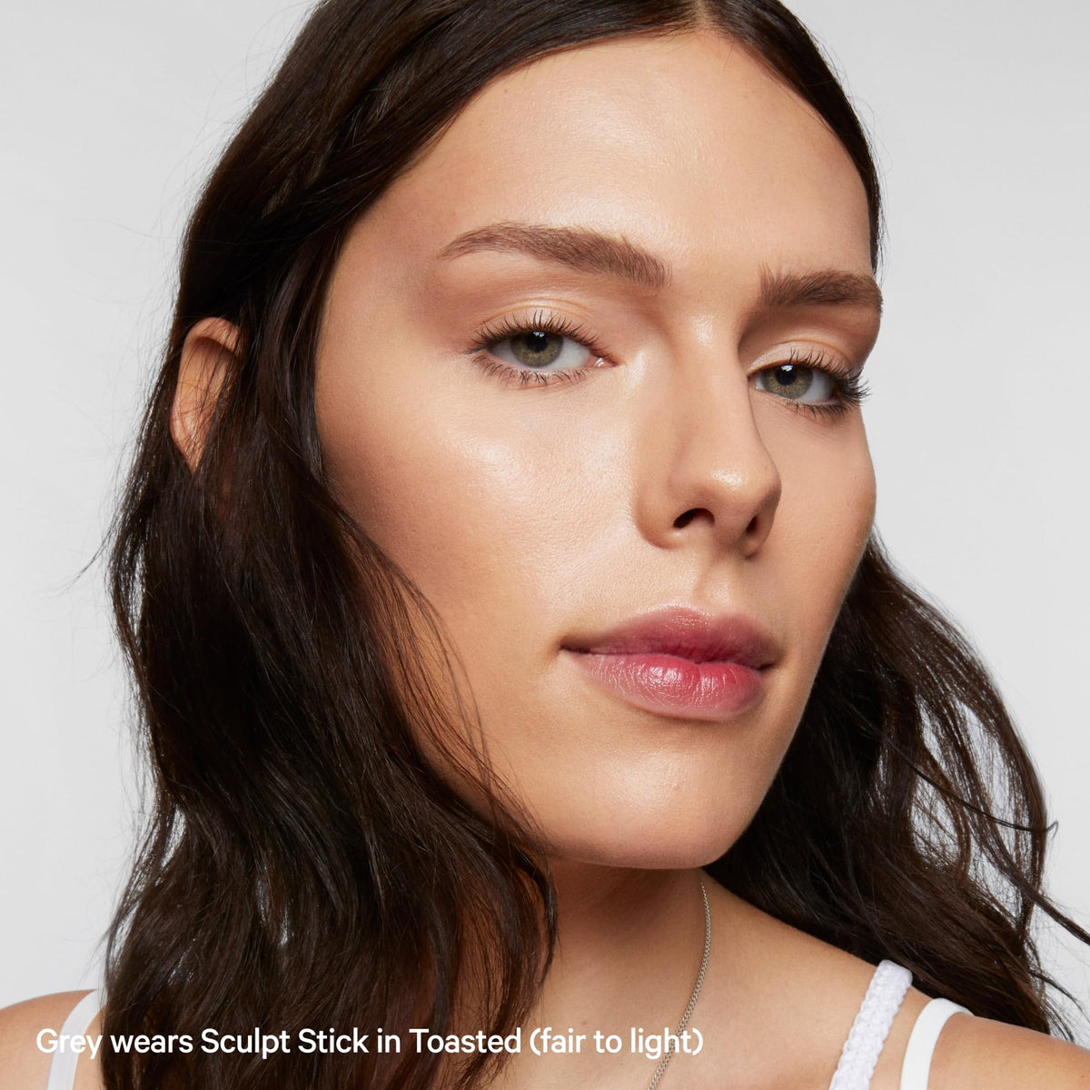Milk Makeup Sculpt Stick label close-up showing clean vegan formulation benefit