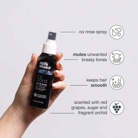 milk_shake mist spraying over hair, demonstrating even pigment distribution benefit