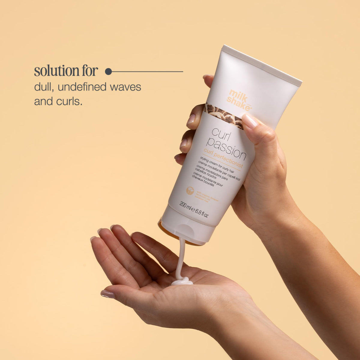 milk_shake applying cream on towel-dried hair demonstrating frizz control benefit