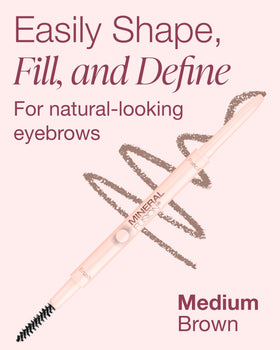 Mineral Fusion pencil held in hand showing compact travel-friendly size