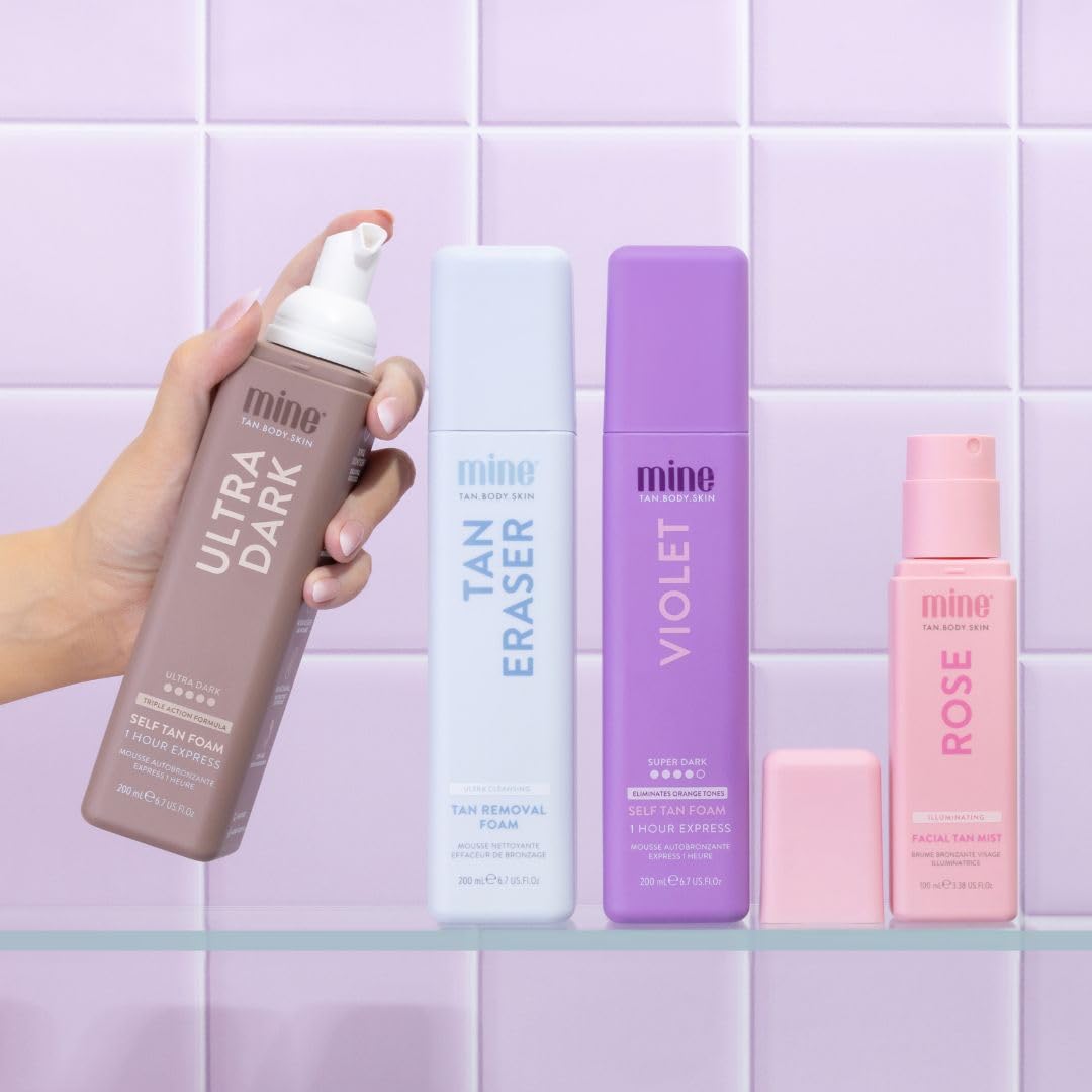 Minetan BODY.SKIN 6.7 fl oz shown in hand for size comparison