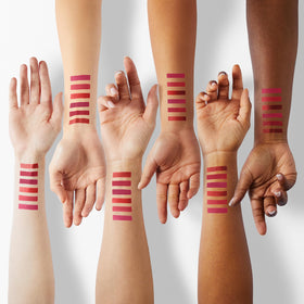 Miniling lip swatch on hand demonstrating rich pigment and blendability