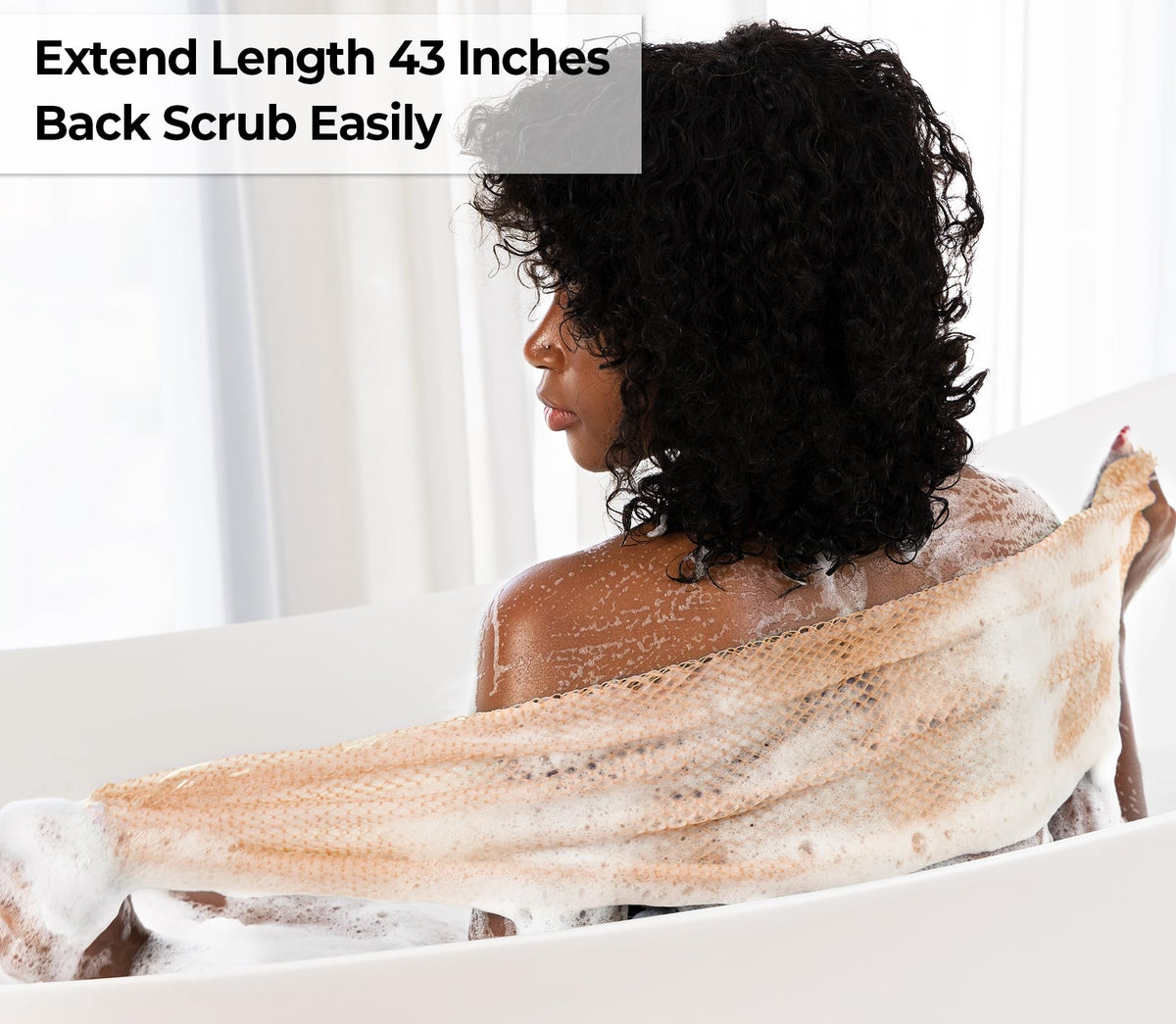 MINISENTIALS sponges styled on bathroom shelf adding color and spa-like ambiance