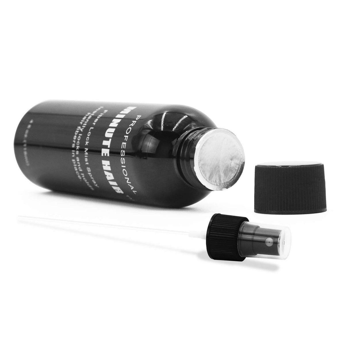 Minute Hair bottle next to ruler showing compact, travel-ready size benefit