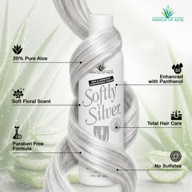 Miracle of Aloe lather on hands demonstrating gentle purple toning foam