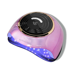 mirage layon next to ruler and box showing compact size and travel-friendly design