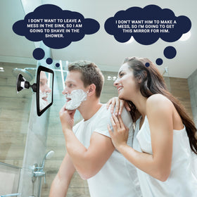 MIRRORVANA beside a razor and towel to show compact travel-friendly size
