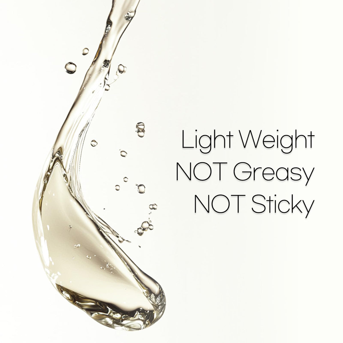 Mise En Scene applying serum to a hair strand for smooth, frizz-free finish