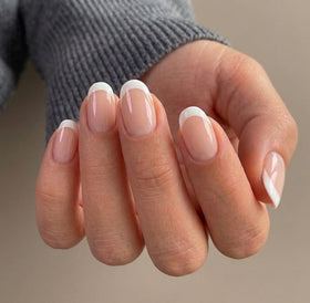 Misssix close-up of white French tip detail highlighting clean cuticle line and polish