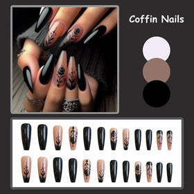 MISUD nails applied on hand, secure glue-on wear for events
