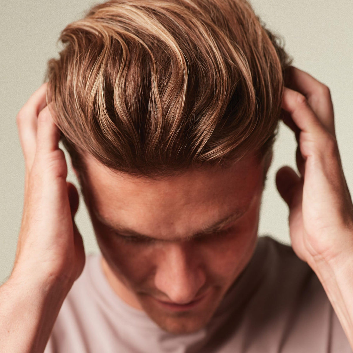 MITCH cream on hands ready for styling to add volume and control