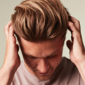 MITCH cream on hands ready for styling to add volume and control