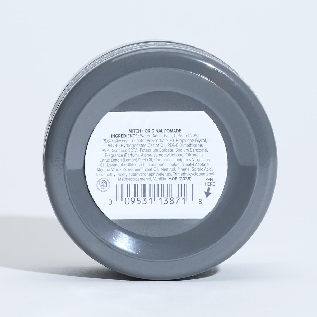 MITCH pomade on bathroom shelf in lifestyle setting conveying everyday use
