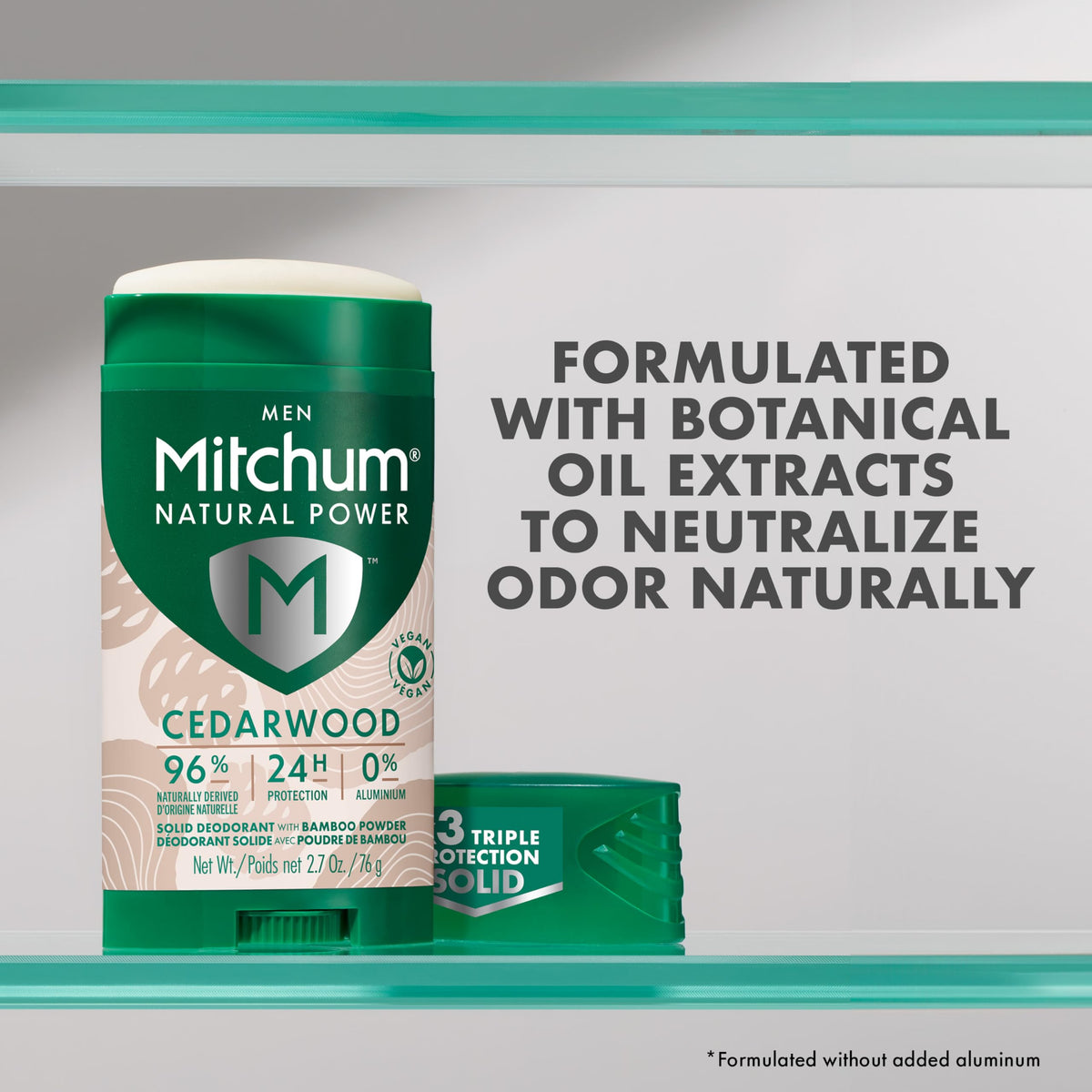 Mitchum 2.7 oz stick size comparison on palm to illustrate travel-friendly convenience