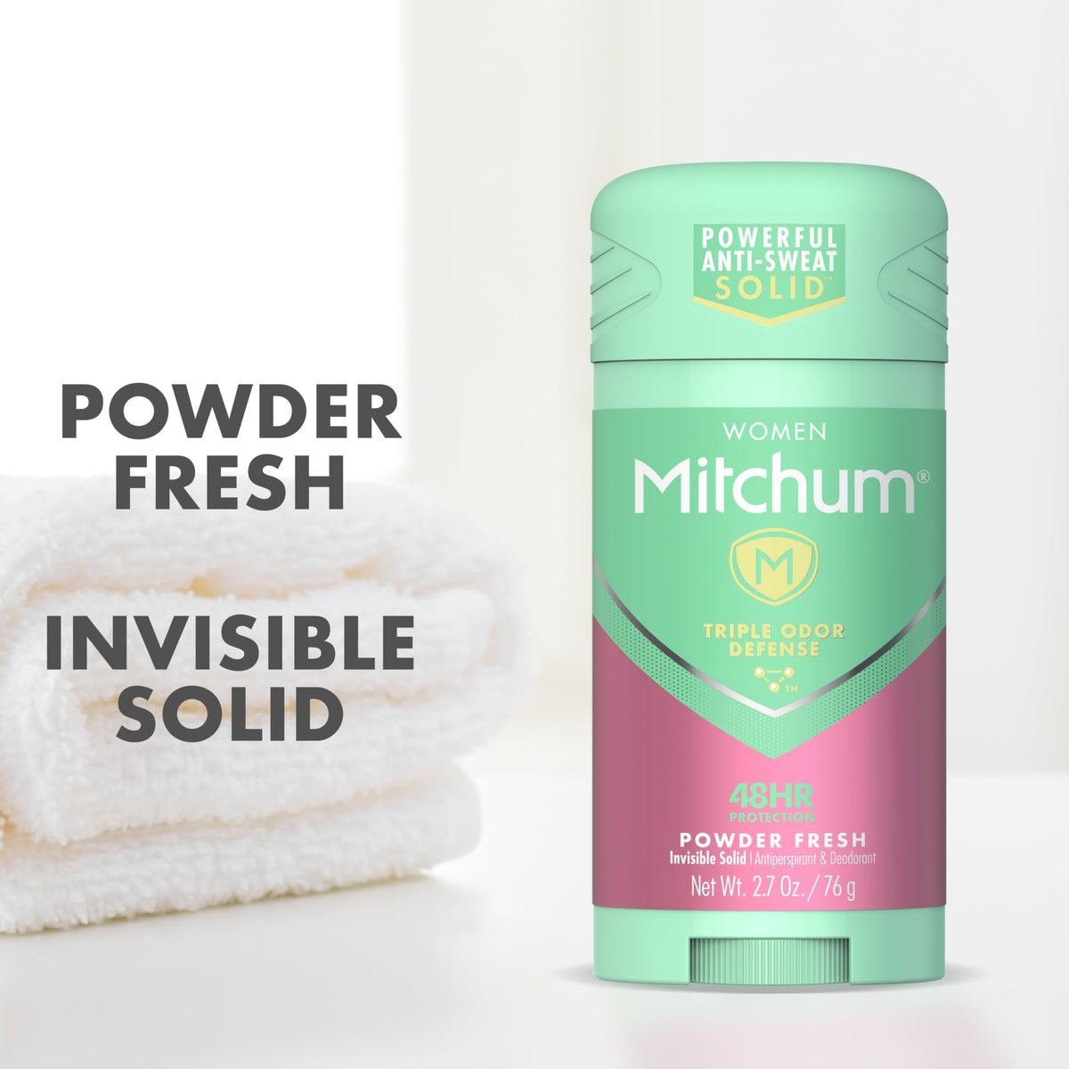 Close-up texture of Mitchum stick showing smooth clear glide benefit