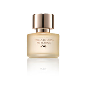 MIX:BAR bottle close-up emphasizing glass texture and rich amber color for premium feel
