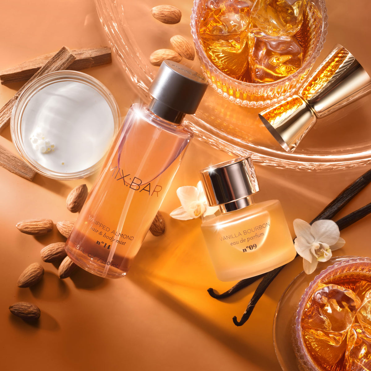MIX:BAR bottle on bed linens and pillow showing cozy atmosphere benefit: comforting scent