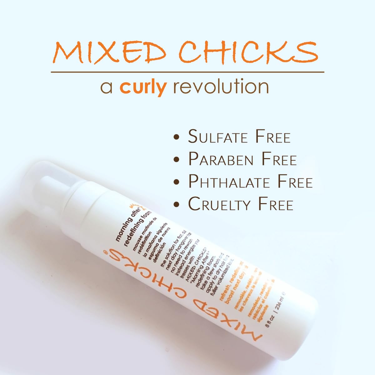 Mixed Chicks applying foam to roots to boost lift and refresh hair