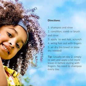 Bowl of natural ingredients with Mixed Chicks bottle highlighting gentle formulation benefit