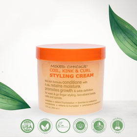 Mixed Chicks model wearing wash-and-go style demonstrating natural definition and bounce