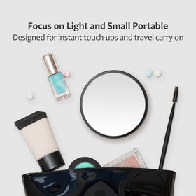 MIYADIVA compact mirror inside a purse illustrating travel convenience