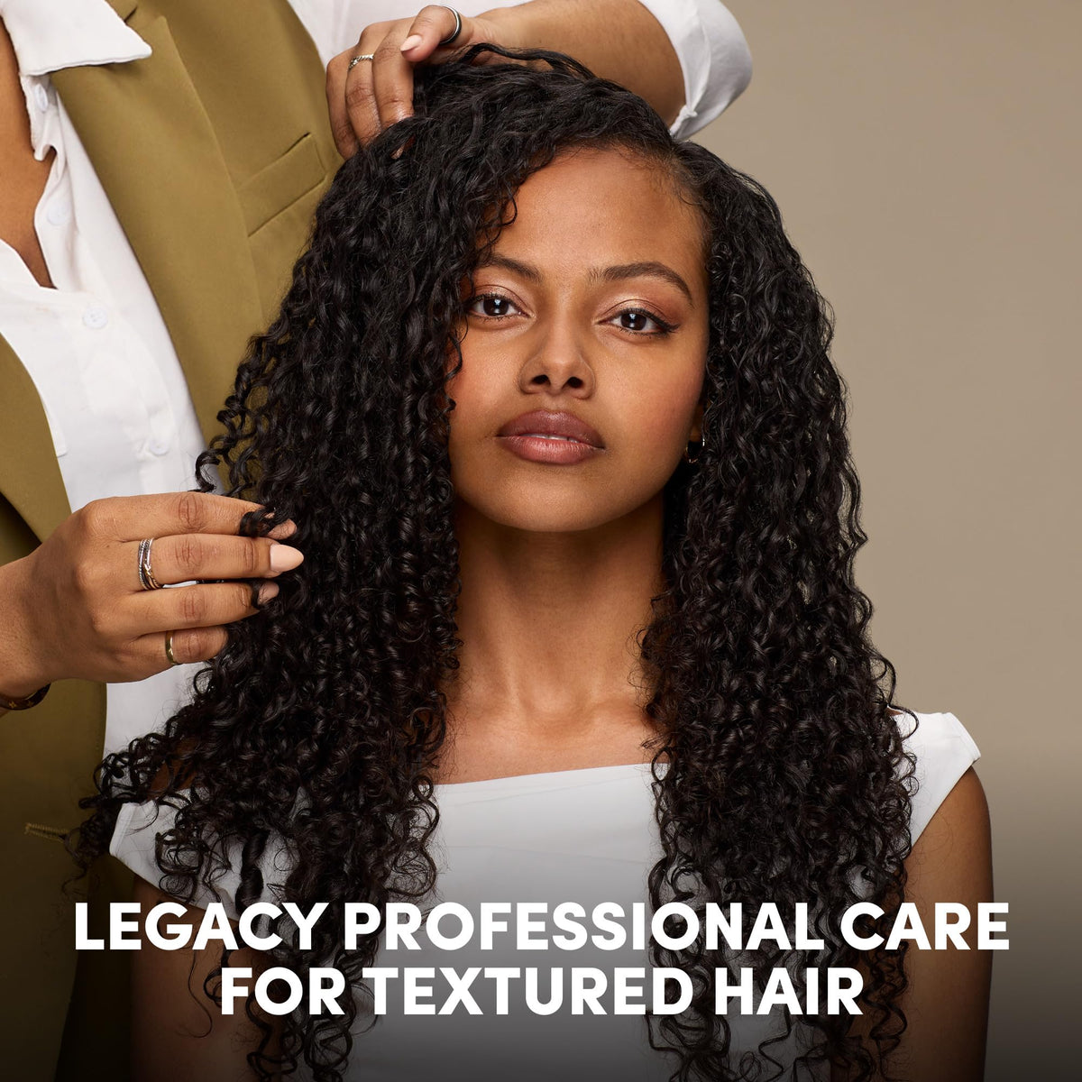 mizani finished curly hairstyle outdoor showing frizz control and healthy shine