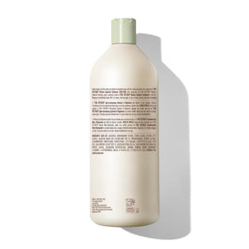 Mizani with coconut and olive close-up emphasizing nourishing oils