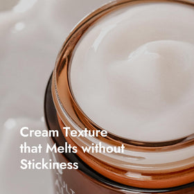 MIZON cream being scooped from jar demonstrating easy application benefit