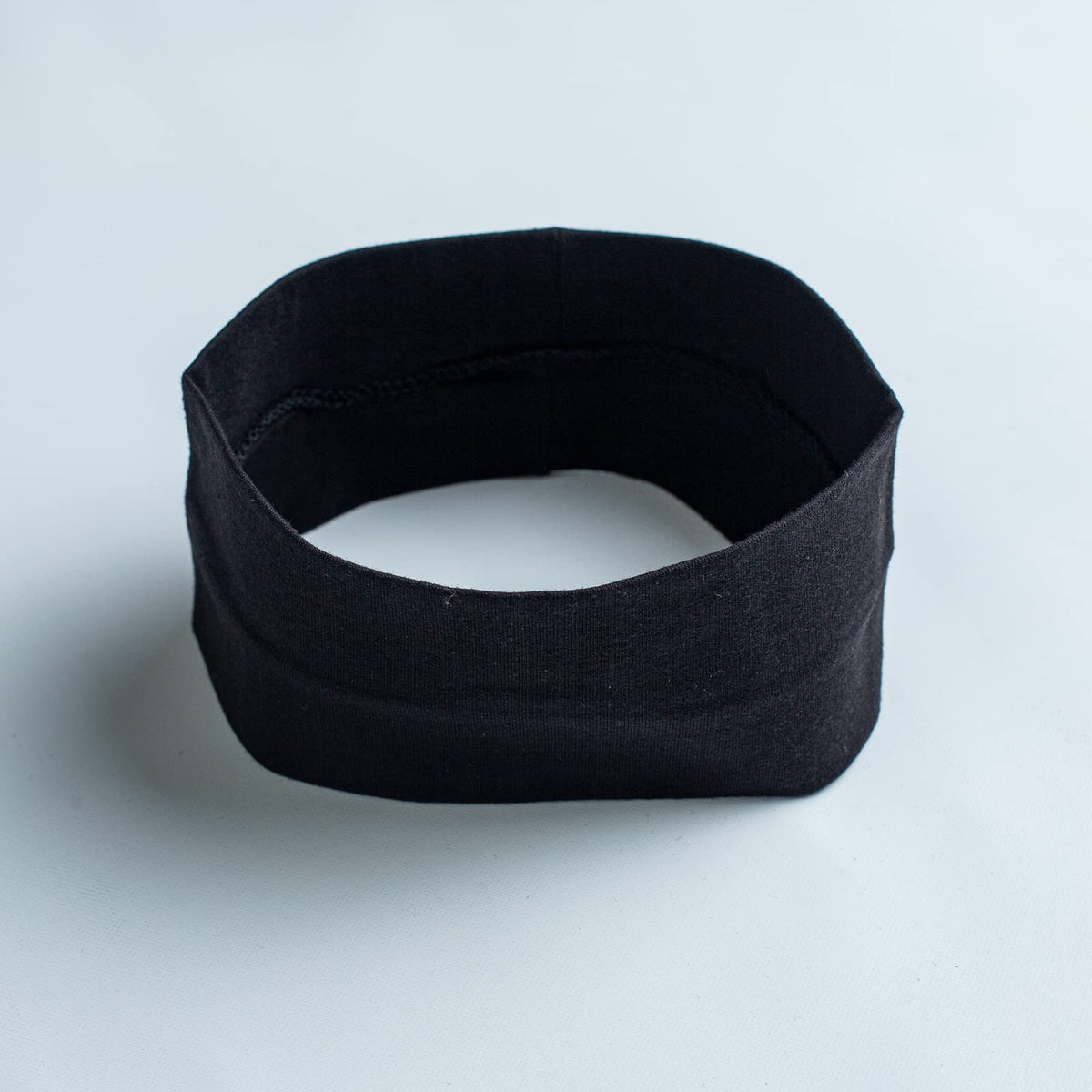 MLMOMVME headbands in laundry basket indicating machine-washable care