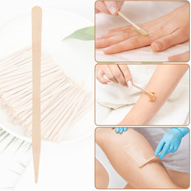 MMonDod applying wax to eyebrow for precise shaping and detail