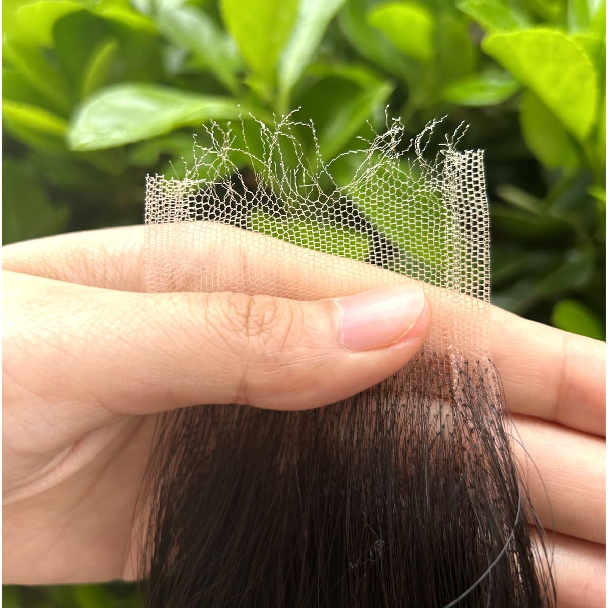 Mnador close-up of ultra-thin 0.095mm Swiss HD lace for undetectable scalp