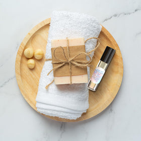 MOBETTER FRAGRANCE OILS held in hand to show travel-friendly size and convenience