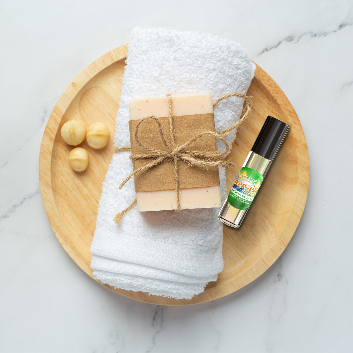 MOBETTER FRAGRANCE OILS travel size next to keys showing compact, pocketable benefit