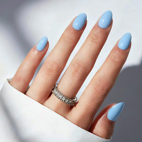 modelones front packaging showing the blue oval press-on nail set, ready for gifting