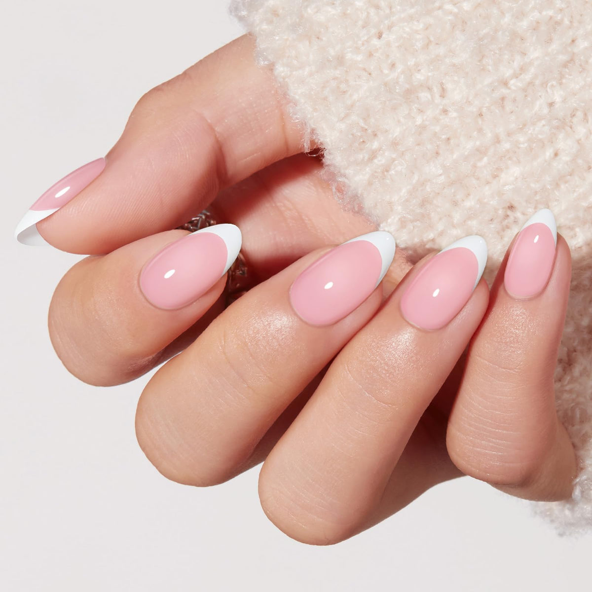 Modelones close-up of French tip detail highlighting crisp white tip precision