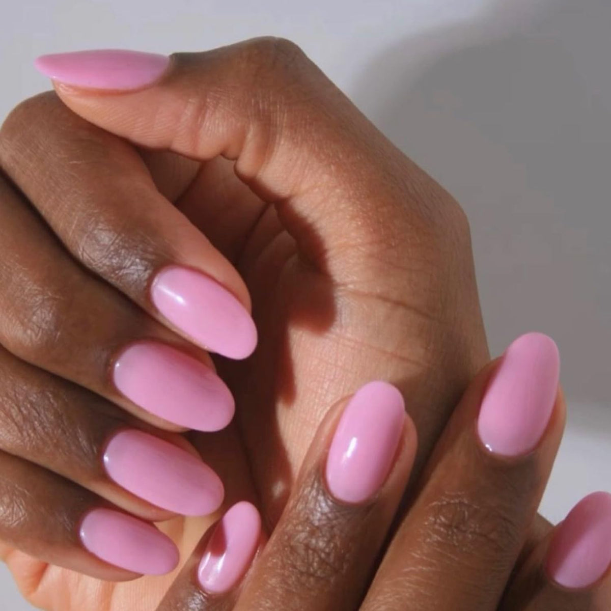modelones close-up of oval nail curvature displaying smooth finish and natural look
