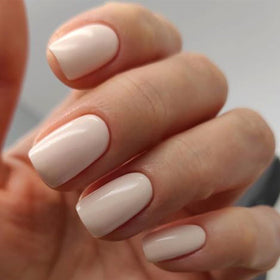 modelones close-up of white-pink finish highlighting glossy smooth look and polish-free benefit