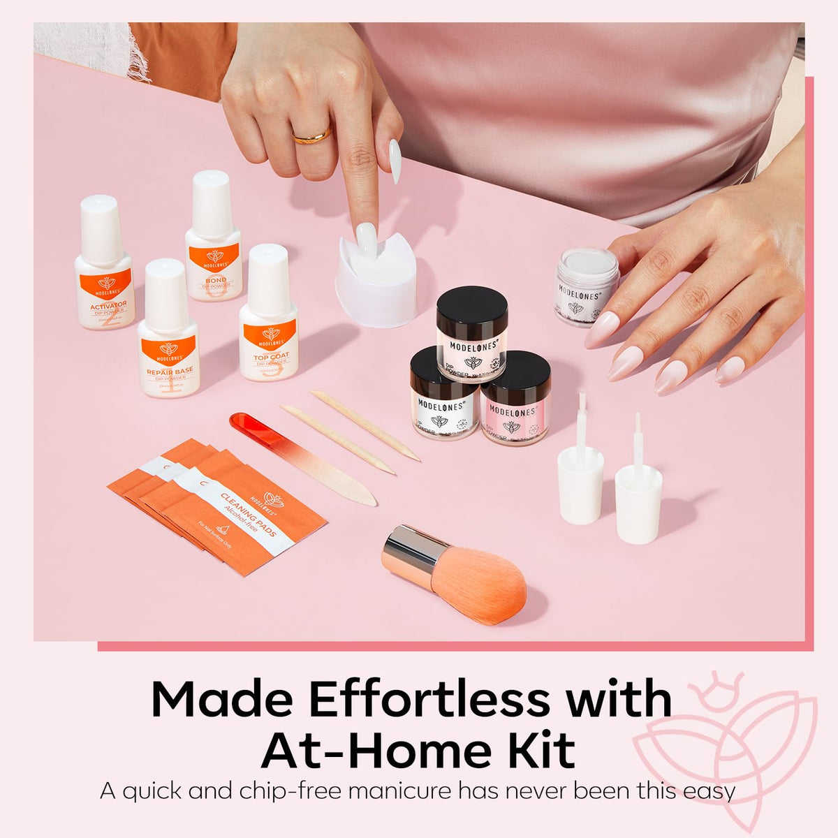Modelones finished natural pink manicure on hands showing salon-quality shine