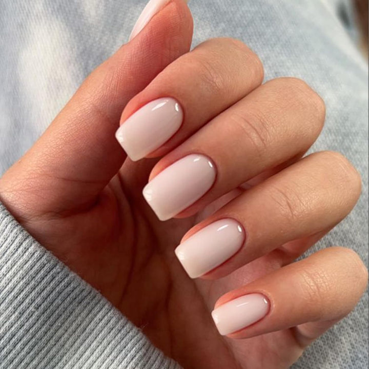 modelones front packaging showing milky white short square nails and kit contents benefit quick styling
