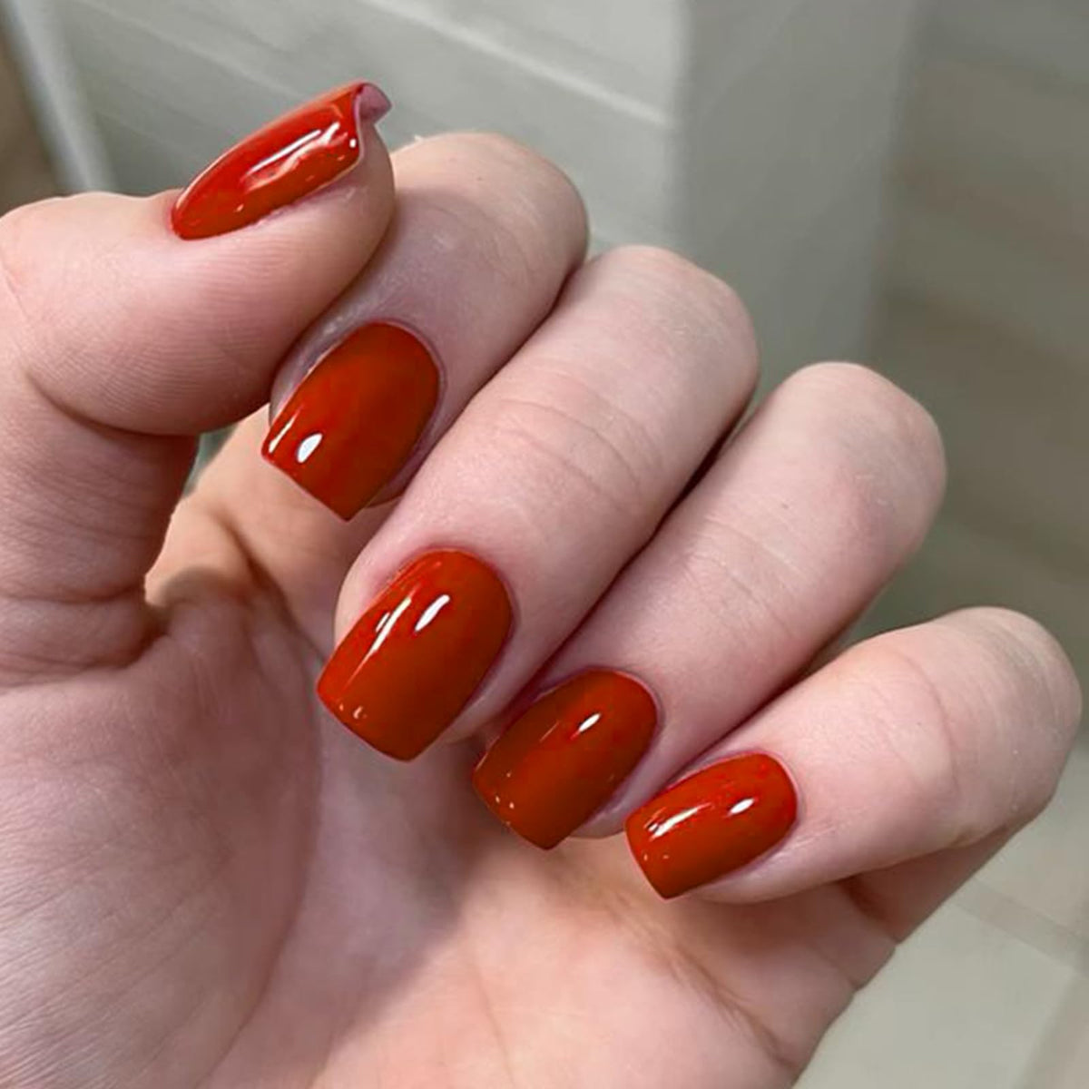 modelones front packaging showing red press-on nails and included kit for convenience
