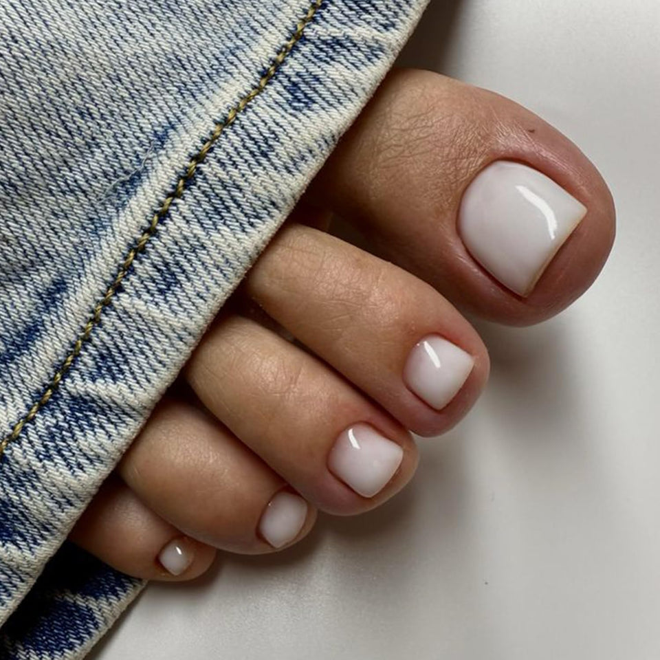 modelones front packaging showing sheer white square toe nails and kit benefits