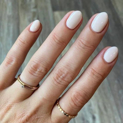 modelones front packaging of white press-on nails showing complete kit and convenience